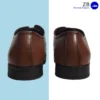 Men's tan formal leather shoes with polished finish and lace-up design